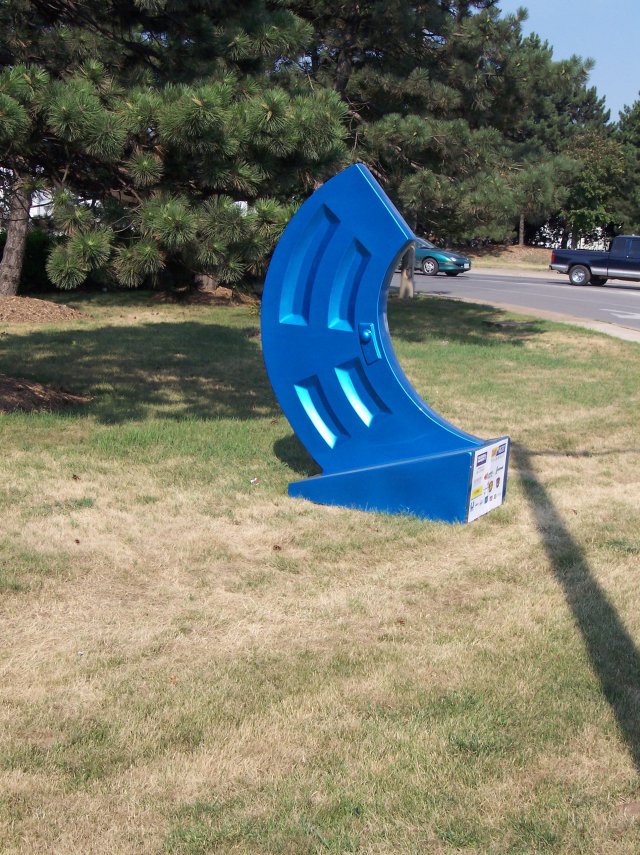 art work door shape like a c for company name, photo by Joseph Raymond, in Hamilton Ontario, Canada, host site ChristianMuse.com